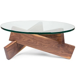 Журнальный столик со стеклянной столешницей на основе из массива дерева.