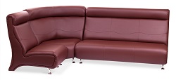 Угловой секционный диван из экокожи на металлических ножках.