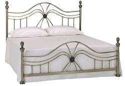Двуспальная металлическая кровать, цвета античной меди.