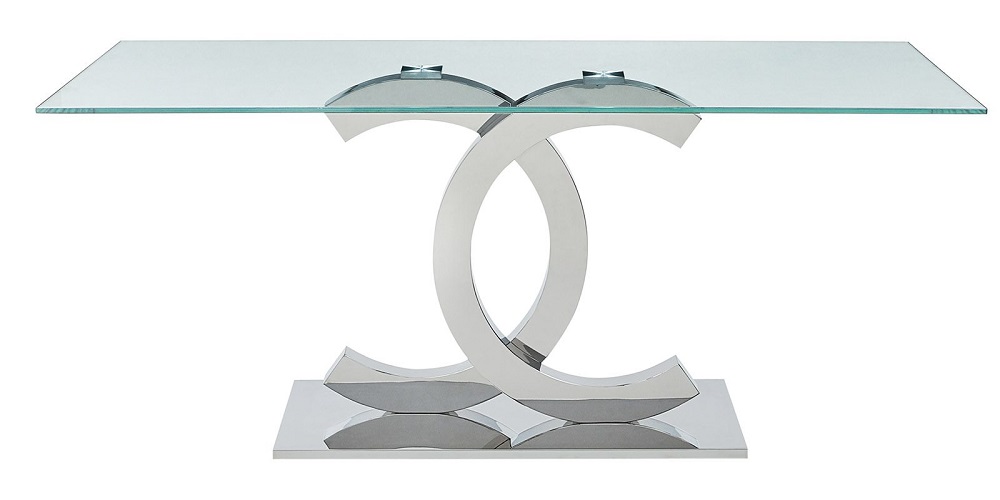 Прямоугольный обеденный стол с прозрачной столешницей.