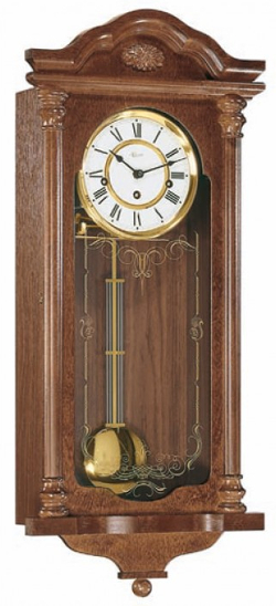 Часы из дерева с пружинным механизмом.