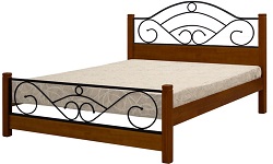 Кровать двуспиночная из массива сосны с металлической ковкой.
