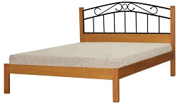 Кровать односпиночная из массива сосны с металлической ковкой. 
