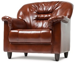 Мягкое кресло из кожзама на деревянных ножках. Цвет коричневый.