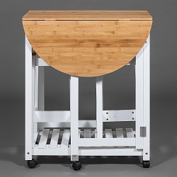 Кухонный столик на роликах с двумя табуретами. Изготовлены из массива сосны и прессованного бамбука 