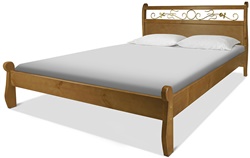 Кровать из натурального дерева с кованными элементами
