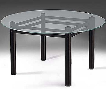 Круглый стеклянный стол на металлическом каркасе.
