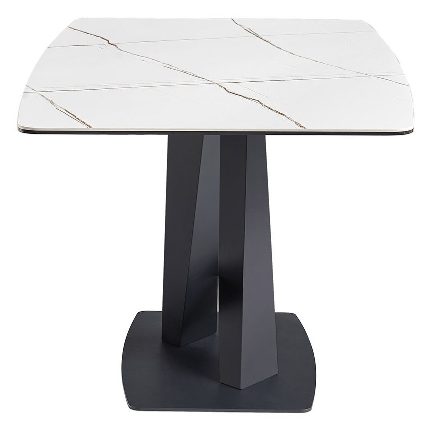 Нераздвижной обеденный стол из белой керамики.