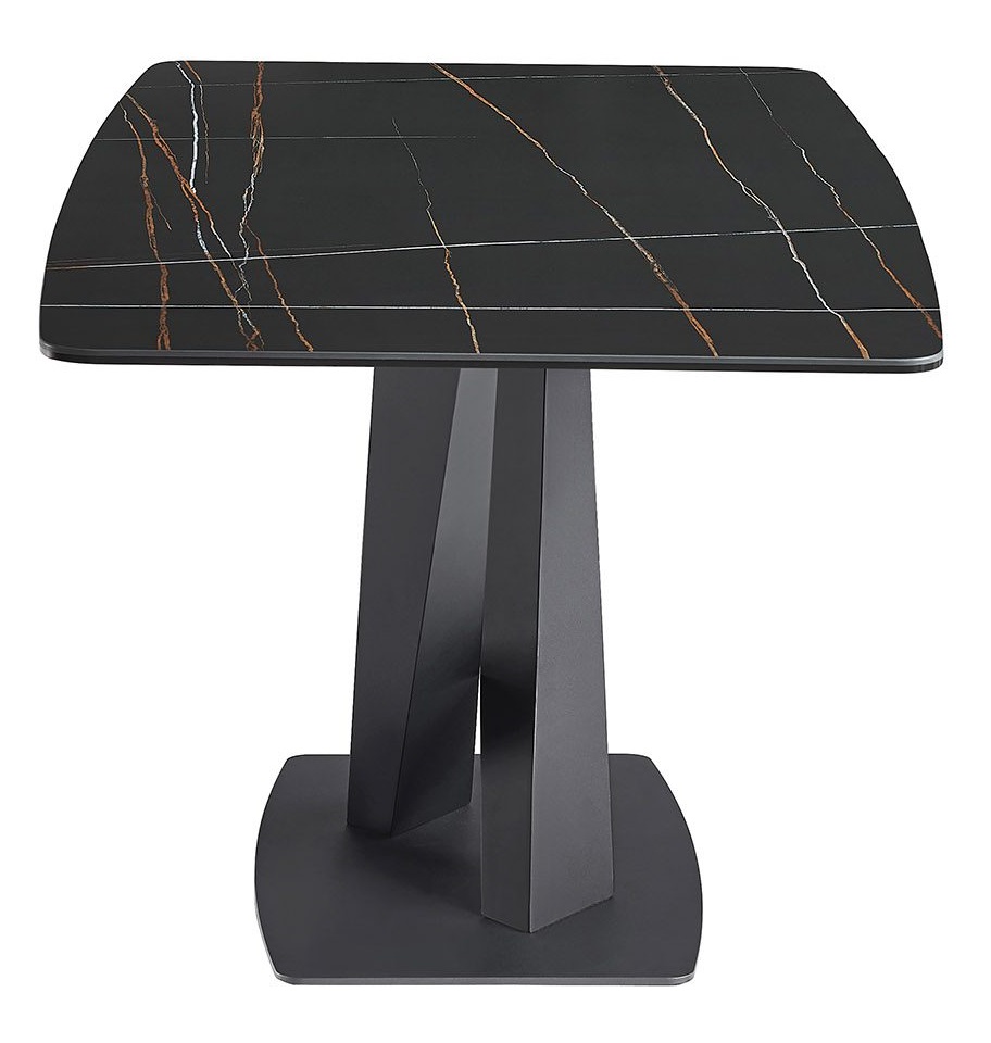 Нераздвижной обеденный стол из черной керамики.
