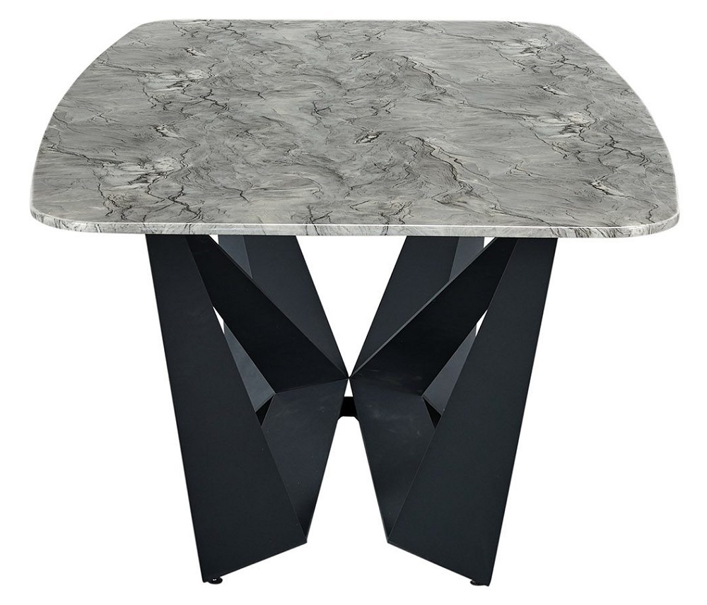 Нераздвижной обеденный стол из серой керамики.