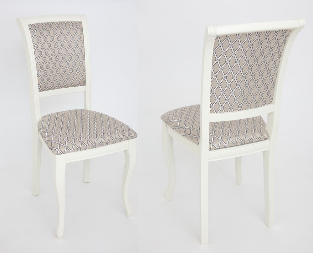 Деревянный стул с обивкой из ткани. Цвет белый, ткань с рисунком.