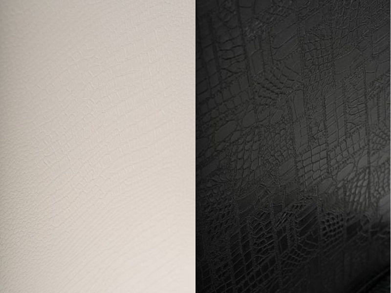 Увеличенный фрагмент обивки стула из искусственной кожи под крокодил. Цвет жемчуг(белый), черный. 