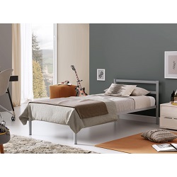 Односпальная металлическая кровать серого цвета. Фото в интерьере.