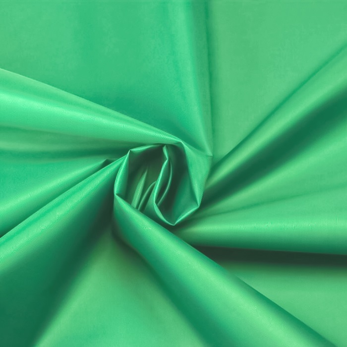 Фрагмент ткани. Цвет зеленый.