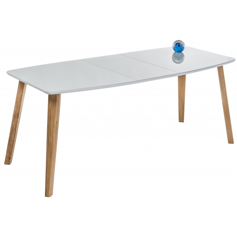 Обеденный стол в разложенном виде со стеклянной столешницей. Цвет глянцевый белый.
