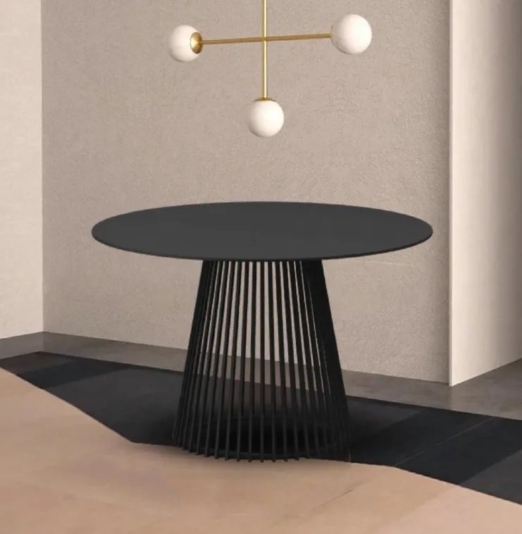 Круглый стол из монолитной керамики в интерьере.