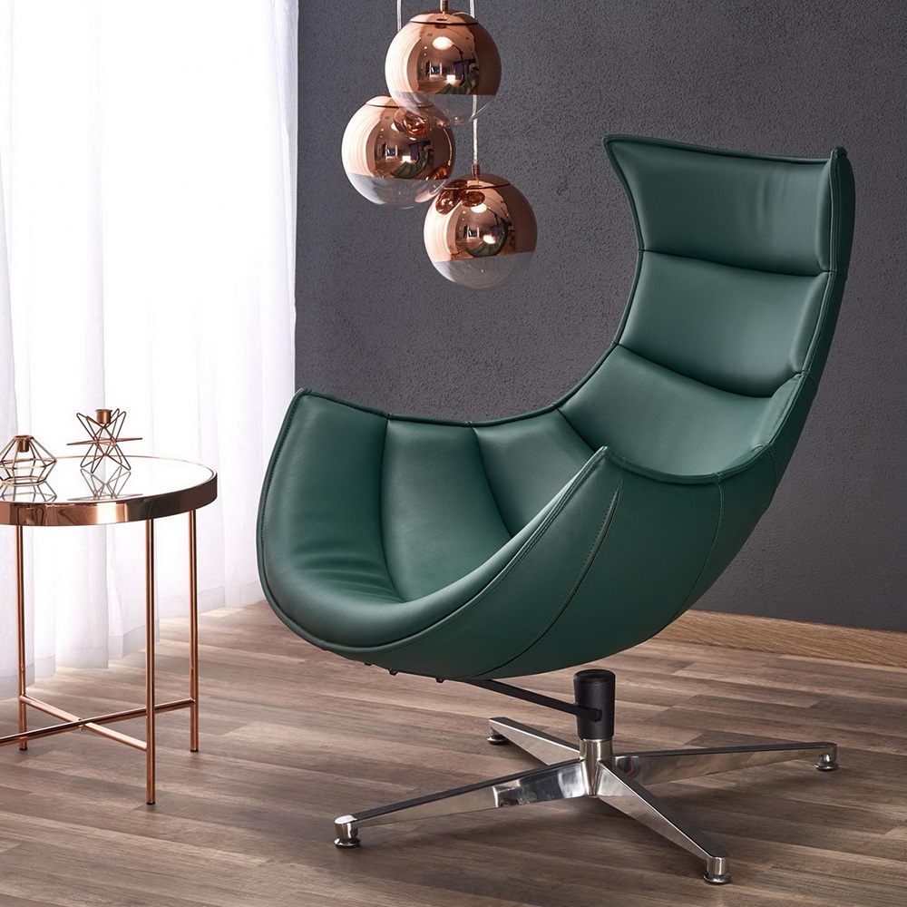 Дизайнерское кресло из прессованной кожи. Цвет зелёный. Фото в интерьере.