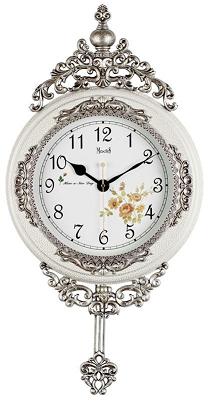 Настенные белые часы в классическом стиле.