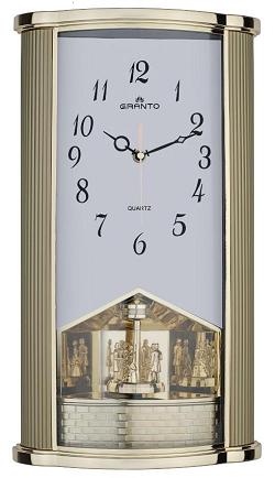 Настенные часы с серо-голубым циферблатом.