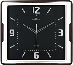 Прямоугольные настенные часы. Цвета циферблата: чёрный. Размеры (в-ш-т): 41х46х6 см.