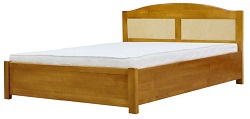 Кровать из сосны с отделкой экокожей.