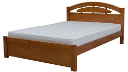 Кровать из массива сосны с двумя спинками.