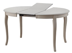 Круглый стол из массива дерева цвета слоновой кости.